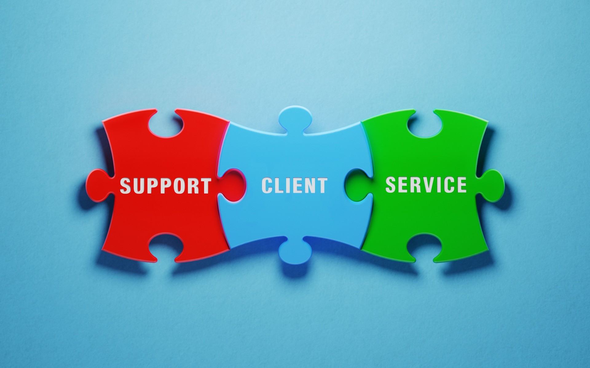 Customer Relationship Management Concept - Colorful Jigsaw Puzzle Pieces On Blue Background